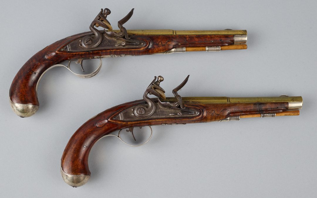 A Pair of Rare Silver Mounted Flint Lock Pistols by Jacob Sees