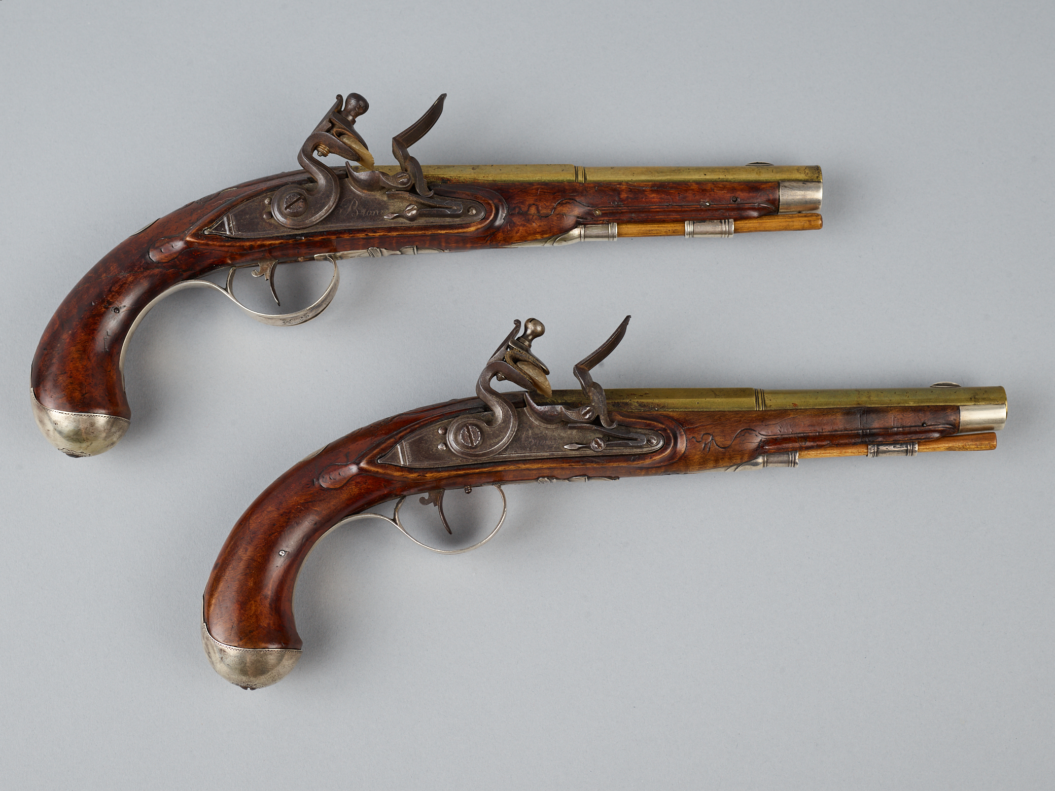 A Pair of Rare Silver Mounted Flint Lock Pistols by Jacob Sees